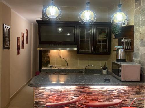 A kitchen or kitchenette at Chalet in Belagio Ain Sokhna