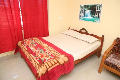 Postel nebo postele na pokoji v ubytování SAI HOLIDAY HOME