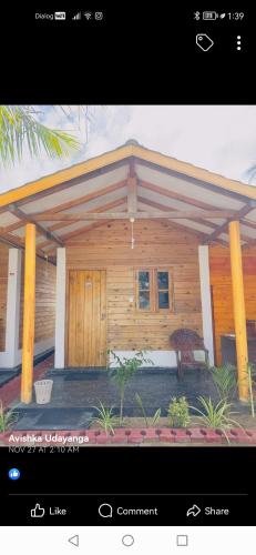 a rendering of a house with a porch at Bashi eco beach cabana in Trincomalee