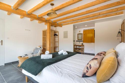 Ένα ή περισσότερα κρεβάτια σε δωμάτιο στο MAISON GAÏA