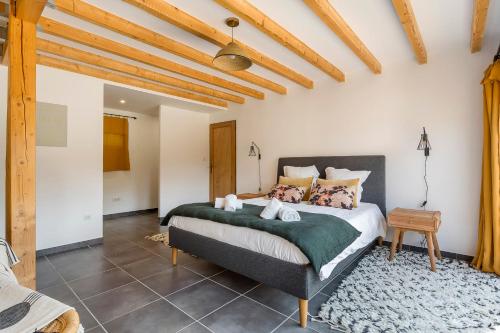 Ένα ή περισσότερα κρεβάτια σε δωμάτιο στο MAISON GAÏA