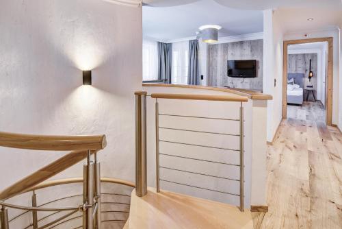 Télévision ou salle de divertissement dans l'établissement Hotel Brigitte
