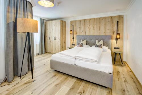 Un ou plusieurs lits dans un hébergement de l'établissement Hotel Brigitte