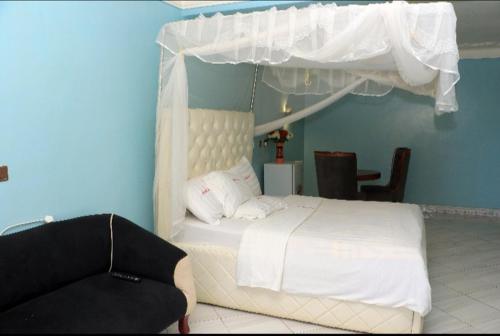 Cama o camas de una habitación en PrimeRose Hotel Mubende
