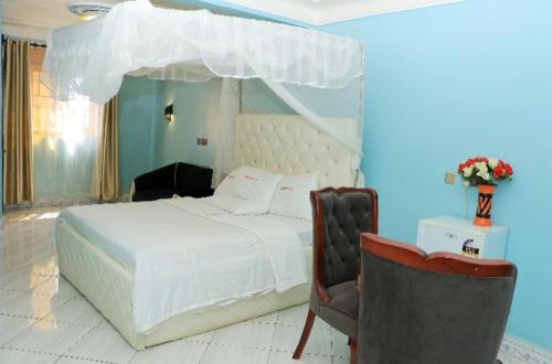Cama o camas de una habitación en PrimeRose Hotel Mubende