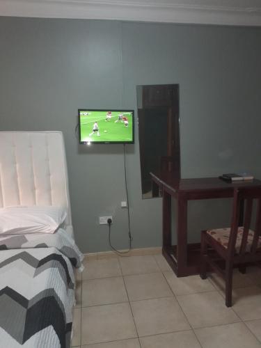 Cama o camas de una habitación en PrimeRose Hotel Mubende