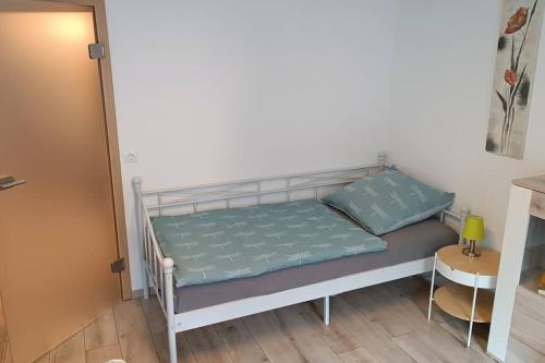 Кровать или кровати в номере Ferienwohnung im Fachwerkhaus