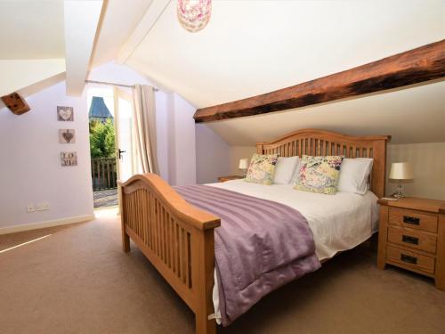 a bedroom with a large bed and a window at 2 bed in Oswestry Powys 36577 in Pen-y-bont-fawr