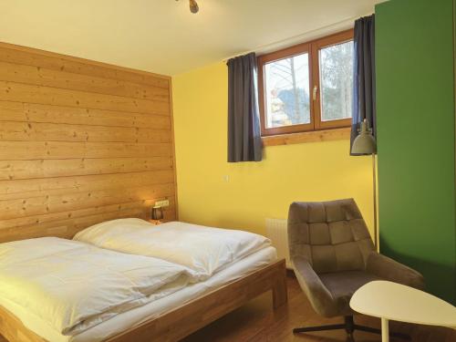 Voodi või voodid majutusasutuse Appartements Skida toas