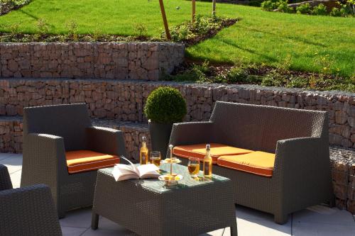 Area soggiorno di Hostellerie Des Châteaux & Spa
