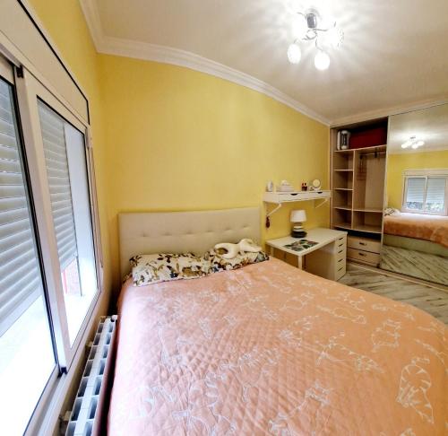 Een bed of bedden in een kamer bij Sweet home