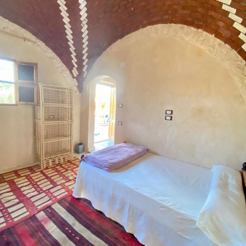 Katil atau katil-katil dalam bilik di Siwa Palace Lodge