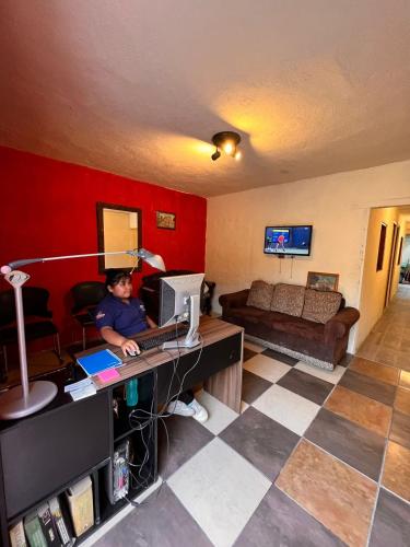 TV a/nebo společenská místnost v ubytování Cristales de Antigua Casa Cristal