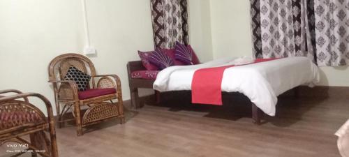 Een bed of bedden in een kamer bij Arcadian Home Stay