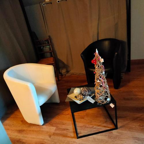 Posezení v ubytování Le val du vieux chêne chambre d'hôtes