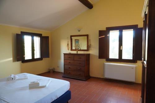 Katil atau katil-katil dalam bilik di Agriturismo Podere Santa Virginia