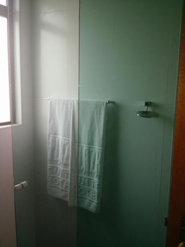 Koupelna v ubytování Plaza Suite Hotel