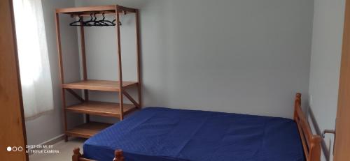Ένα ή περισσότερα κρεβάτια σε δωμάτιο στο Residencial Oceano Azul