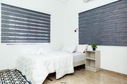 Φωτογραφία από το άλμπουμ του Cozy Luxury - East Legon Apt - WiFi, Netflix & AC σε Accra