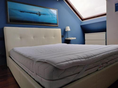 Una cama o camas en una habitación de Mansarda DaSy