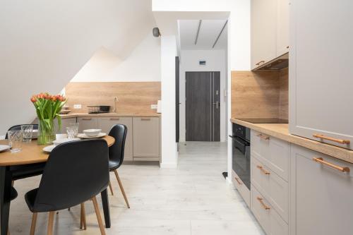 Kuchyň nebo kuchyňský kout v ubytování Apartament Starówka by RENT4YOU