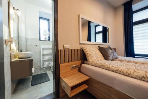 Koupelna v ubytování Gerab Resort