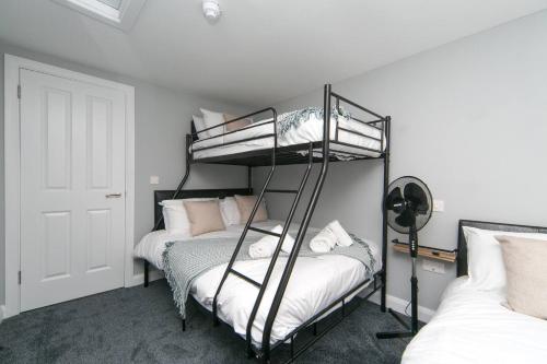 Katil atau katil-katil dalam bilik di Pass the Keys Self Contained Apartment at Country Pub Restaurant
