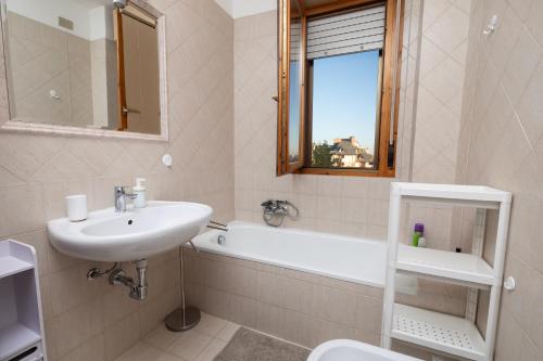 Koupelna v ubytování Apartment Forum IV