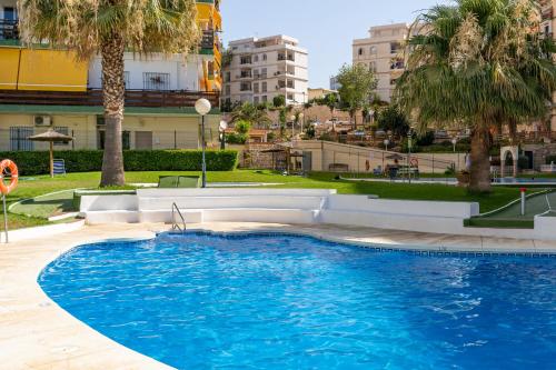 NAC8 - Bonito apartamento con vistas al mar 2 dormitorios, Wifi, 3 Piscinas, Playa a 250 metros