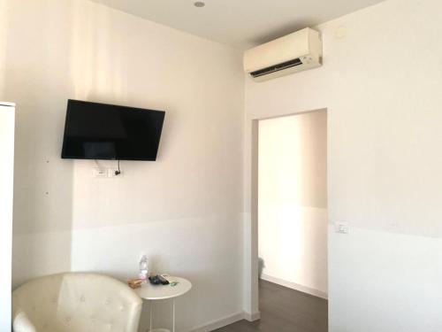 TV a/nebo společenská místnost v ubytování Confortini Rooms SUNDAY