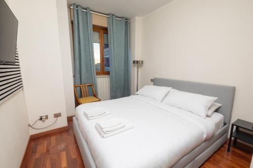 Postel nebo postele na pokoji v ubytování Apartment Forum IV