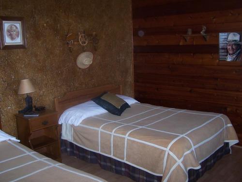 Postel nebo postele na pokoji v ubytování Chateau Lodge