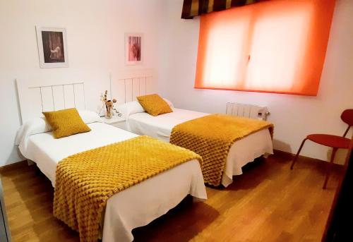 Ein Bett oder Betten in einem Zimmer der Unterkunft Apartamento Obao