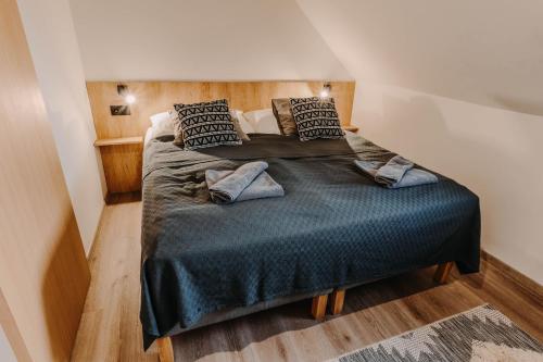 Postel nebo postele na pokoji v ubytování BILÍKOVA CHATA - Horský hotel