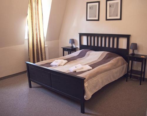 Postel nebo postele na pokoji v ubytování Hotel St.Michael