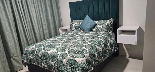 Postel nebo postele na pokoji v ubytování Bella Mare Paradise