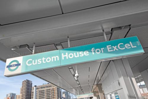 a sign that reads question house for excel at a building at Excel 3 Bedroom Apartment Near City Airport and O2 Arena in London