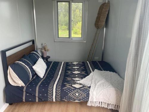Ein Bett oder Betten in einem Zimmer der Unterkunft Beachside Bungalows