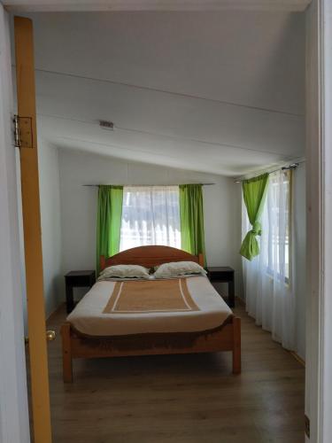 Katil atau katil-katil dalam bilik di Posada de la Luna