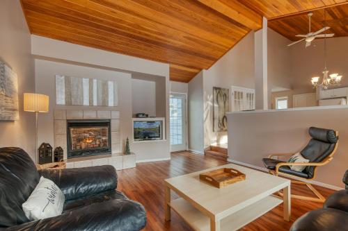 a living room with a couch and a table at RidgeView Resort in Radium Hot Springs