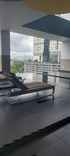 a bed sitting on top of a building at TWIN GALAXY JB Homestay by SUMMER in Johor Bahru