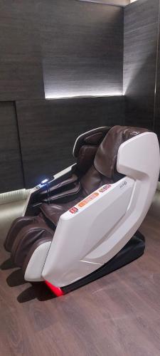 a close up of a hair dryer sitting on the floor at TWIN GALAXY JB Homestay by SUMMER in Johor Bahru