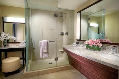 a bathroom with a sink and a shower at Nice Unit at The Hard Rock Cafe Casino Atlantic City in Atlantic City