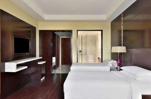 Katil atau katil-katil dalam bilik di Jaipur Marriott Hotel