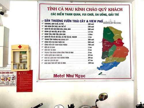 a menu on the wall of a kitchen at Như Ngọc Motel in Cà Mau