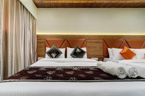 Postel nebo postele na pokoji v ubytování Hotel Archith