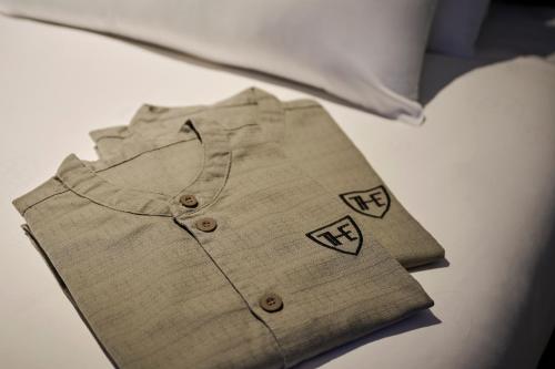 a close up of a brown shirt with squares on it at The Royal Park Hotel Iconic Nagoya in Nagoya