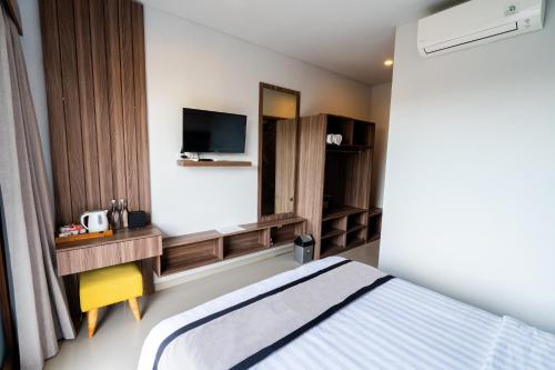 TV a/nebo společenská místnost v ubytování Mahesa Suites Seminyak