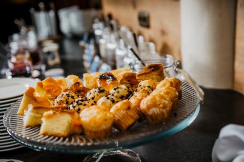 a plate of food on top of a table at Hotel Landskron in Bruck an der Mur