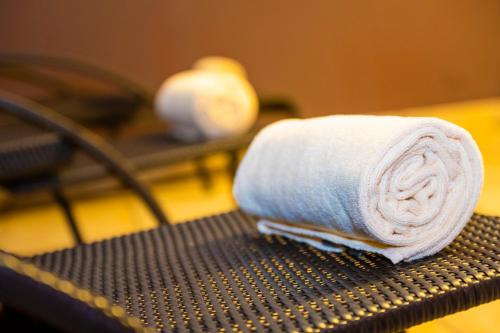 a roll of paper towels sitting on a bench at Hotel Landskron in Bruck an der Mur